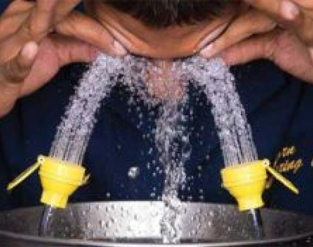 Eye wash fountain in use